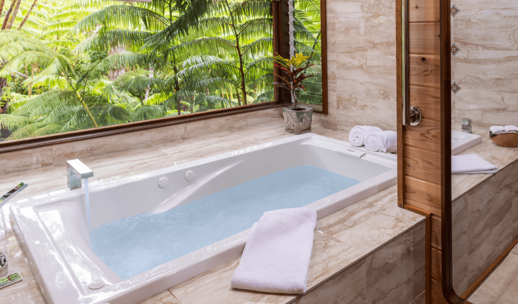 Image of jetted soaking tub in suites at lotus garden cottages in volcano hawaii