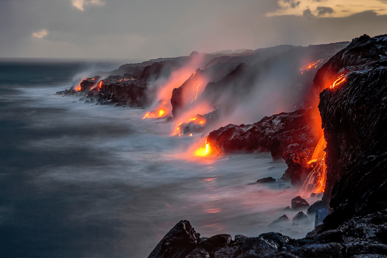 Image of lave flowing over cliff in Hawaii at Volcano National Park