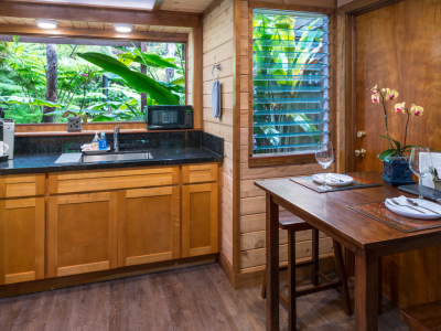 Image of kitchenette in white lotus suite at Lotus Garden Cottages in Volcano Hawaii