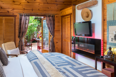 Image of king bed at lotus garden cottages volcano village